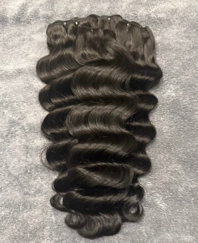 Human hair bundles of loose deep wave piled together