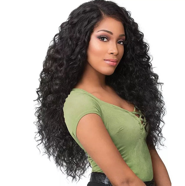 Beautiful Brown woman wearing Brazilian Natural wavy human hair