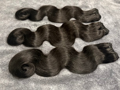 Three bundles of Human hair in body wavy