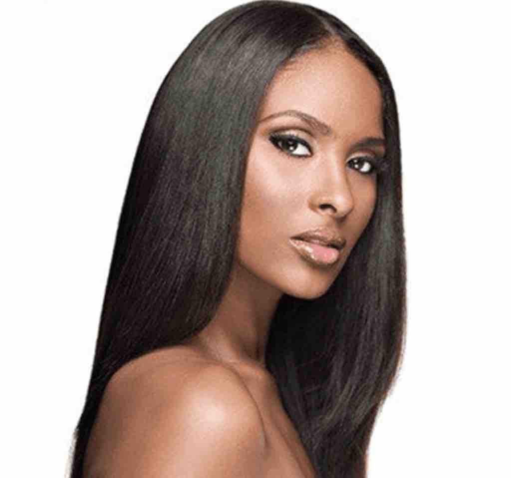 Beautiful Afro Caribbean woman wearing Brazilian silky straight human hair extensions