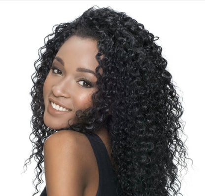 Woman with long, curly black hair on a white background
